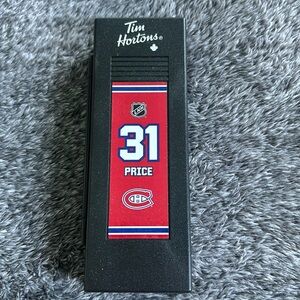 Tim Hortons NHL PA alumni carry goalie stick